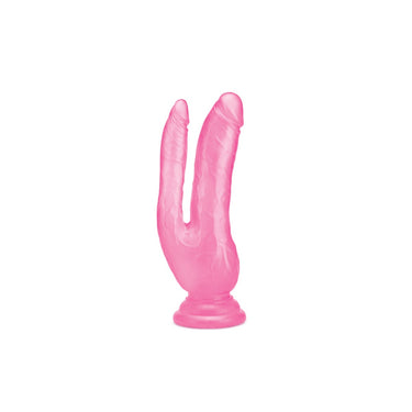 a pink plastic toy shaped like a worm